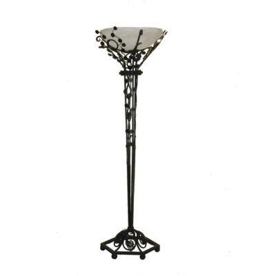 A black metal lamp with white glass shade.