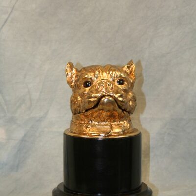 An "Empire Style Bronze Gold Bull Dog Ink Well" on a pedestal.