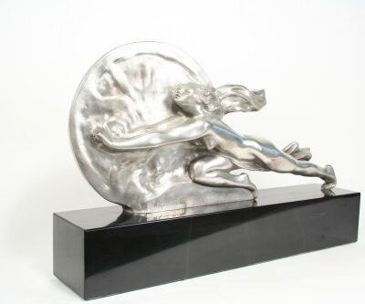 A Gennarelli Bronze Art Deco Sculpture Towards Destiny of a woman on a black and white base.