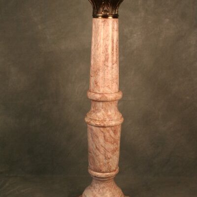A Bronze Marble Corinthian Column Pedestal with a gold base.