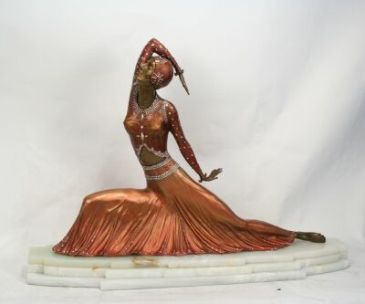 A DH Chiparus Art Deco Cast Bronze Statue Clara dancing on a marble base.