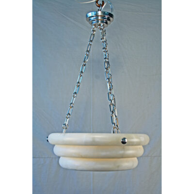 A hanging light fixture with chains on the ceiling.