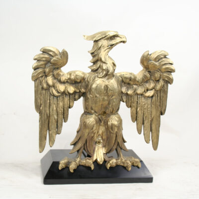 A statue of an eagle with wings spread.