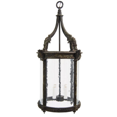 A lantern with a glass cover and metal frame.