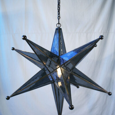 A blue star light hanging from the ceiling.