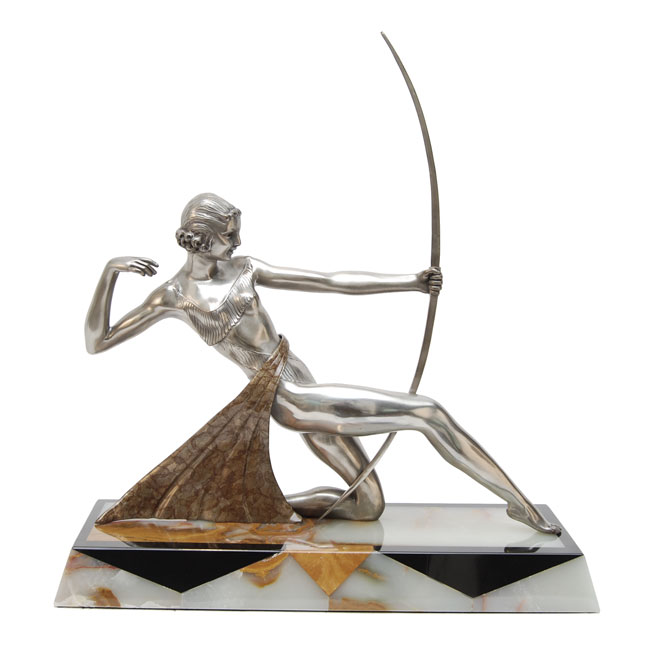 A statue of a woman holding a bow and arrow.