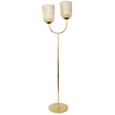 A gold floor lamp with two lights on top of it.