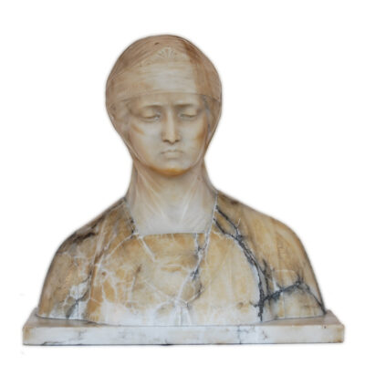 A marble bust of a woman with long hair.