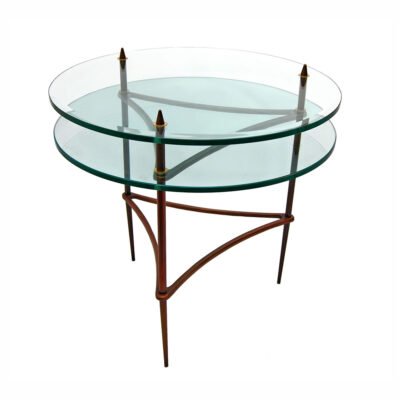 A glass table with two round tables on top.