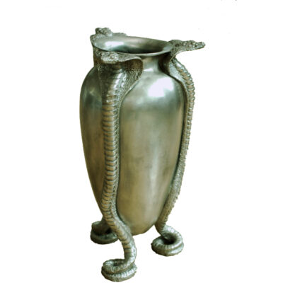 A silver vase with two snakes on the bottom of it.