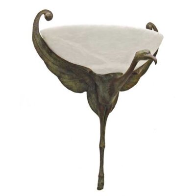 A bird shaped bowl with white cloth on top.