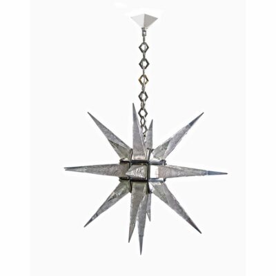 A chandelier with a metal star on top of it.