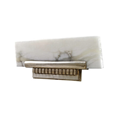 A marble and brass wall light fixture.