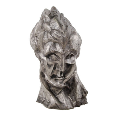 A silver statue of a woman 's face.